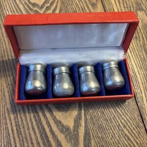 4 Salt and Pepper Shakers in Original Box pre owned silver colored
